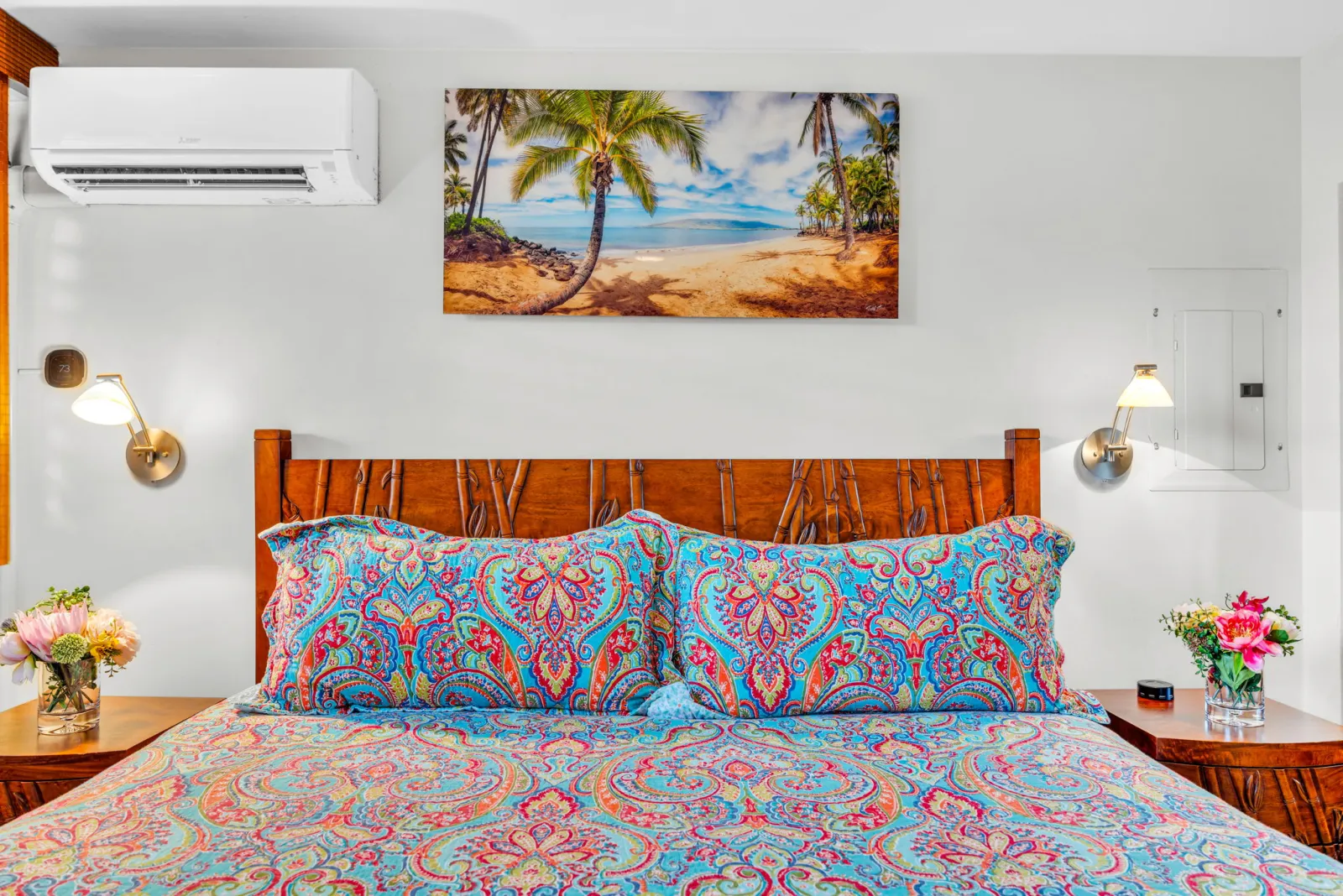 Bedroom with split-system air conditioning above the bed