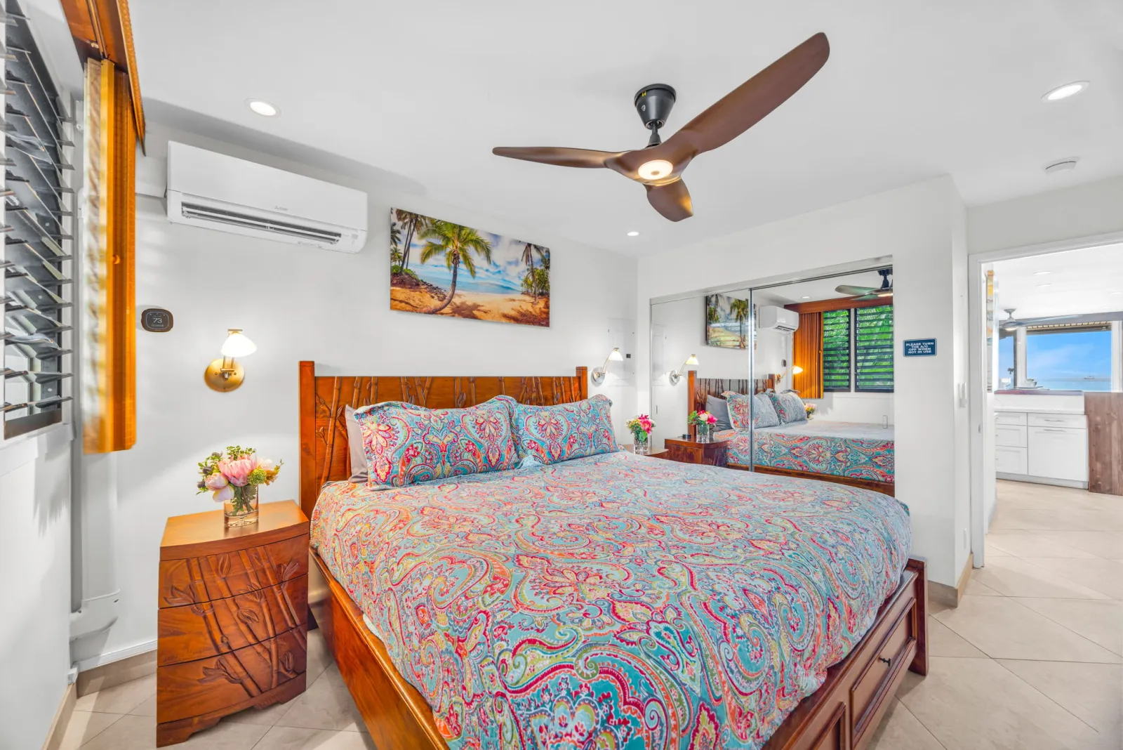 Bedroom with a king bed and ceiling fan