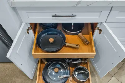 Deep drawer stocked with pots and pans
