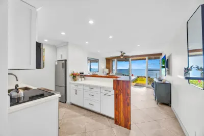 The full kitchen with stainless appliances