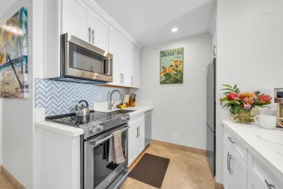 Range and oven with chevron tile backsplash
