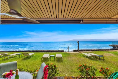 View from under the lanai across the lawn to the water