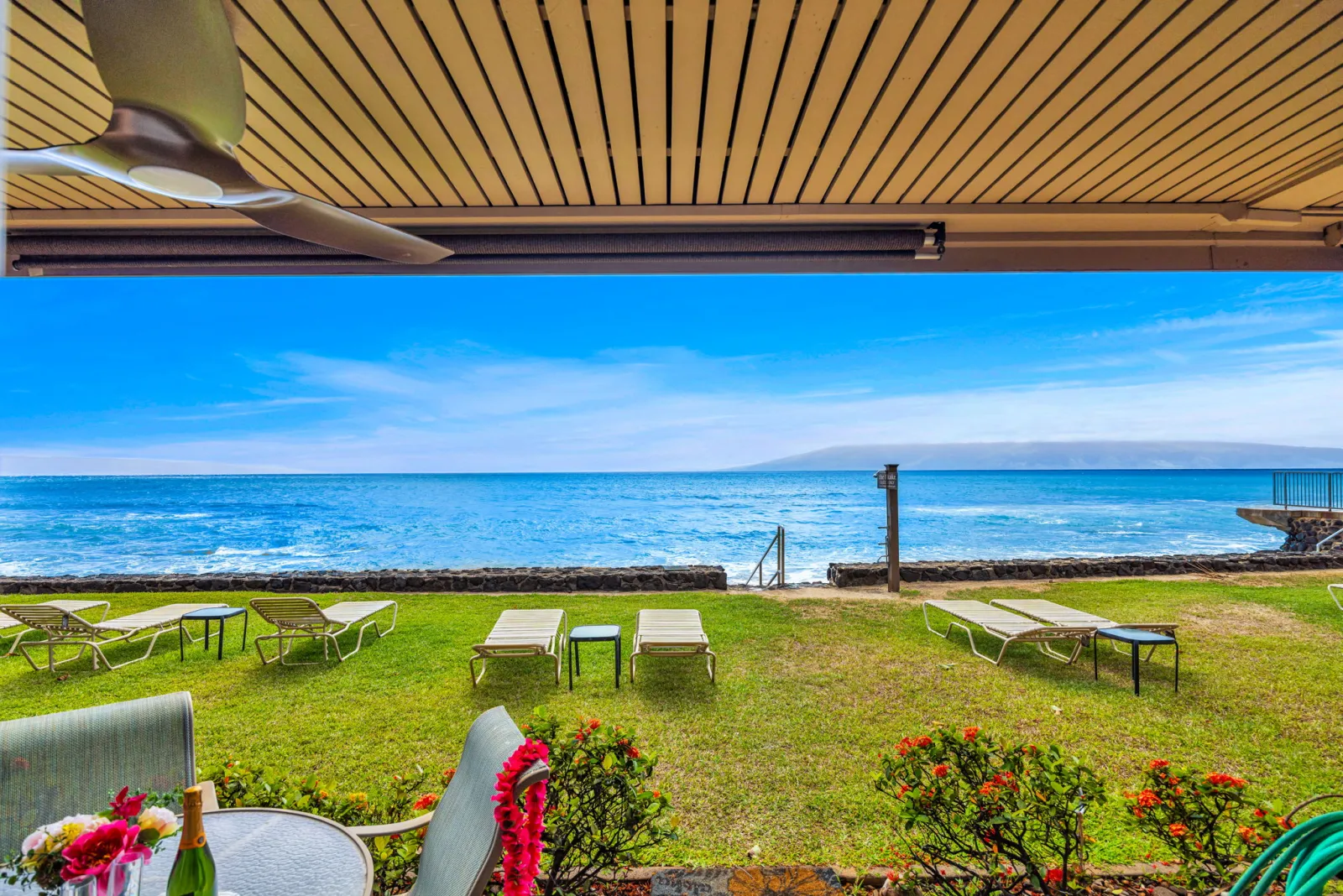 View from under the lanai across the lawn to the water