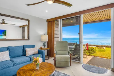 Living room seating with a recliner beside the slider